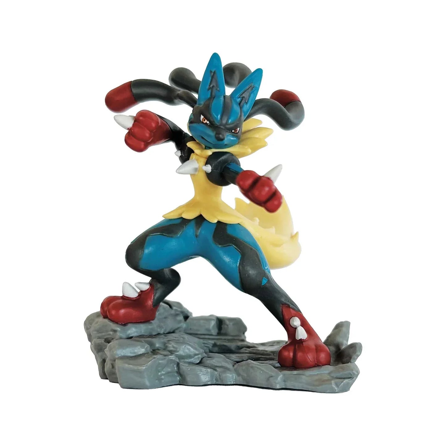 Colorful figurine of a character on a rocky base against a white background
